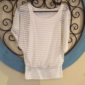 Lined sheer white and silver dolman top.